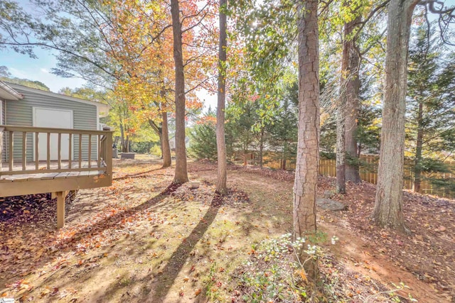 view of yard with a deck