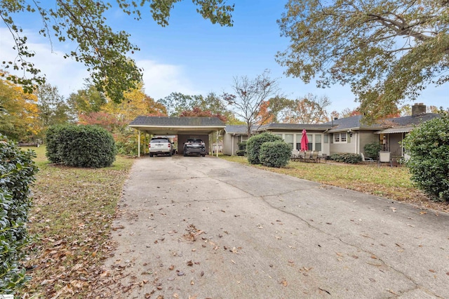 ranch-style house with a carport