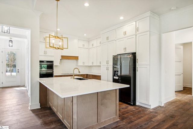 kitchen with white cabinets, stainless steel appliances, dark hardwood / wood-style flooring, and hanging light fixtures