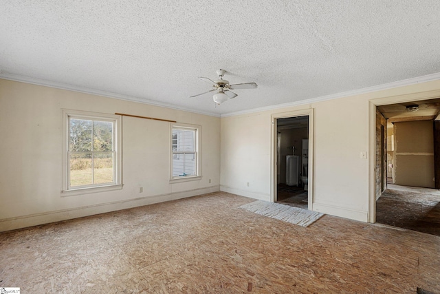 spare room with ornamental molding, a textured ceiling, and ceiling fan