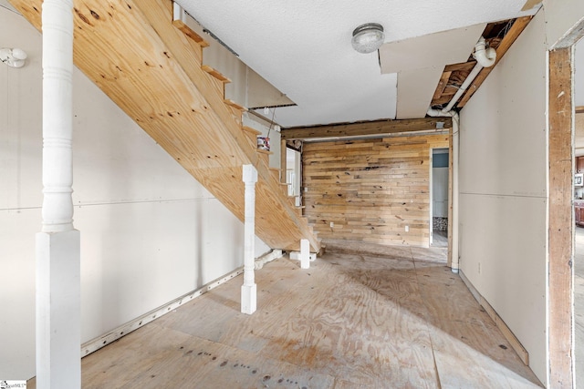 basement with wooden walls