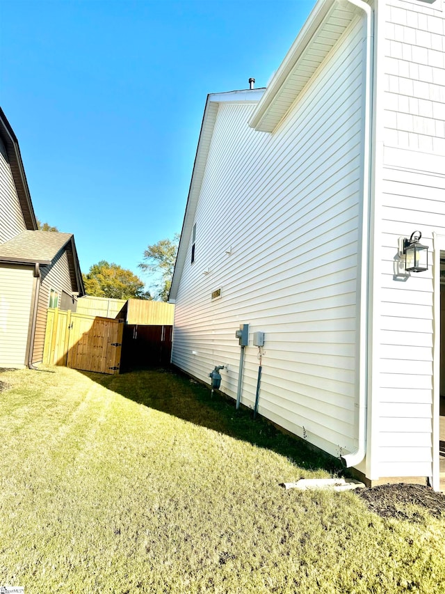 view of home's exterior featuring a lawn