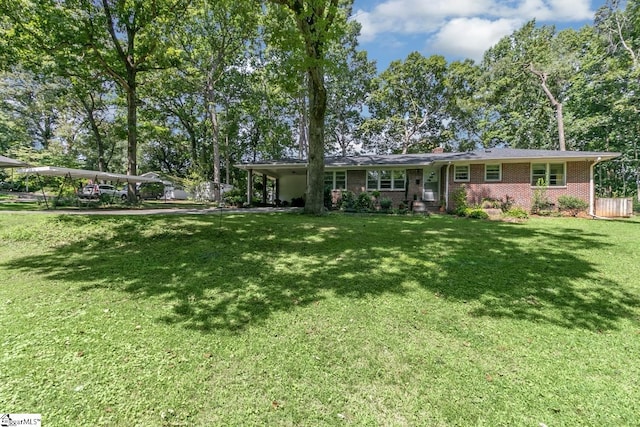 ranch-style home featuring a front yard