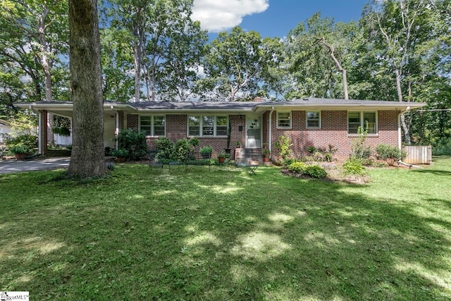 single story home with a carport and a front lawn