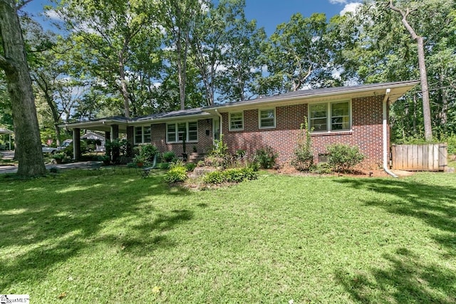 ranch-style house featuring a front lawn