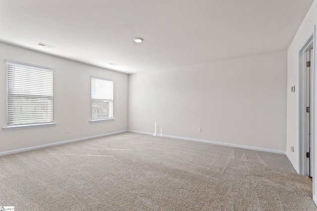 view of carpeted spare room