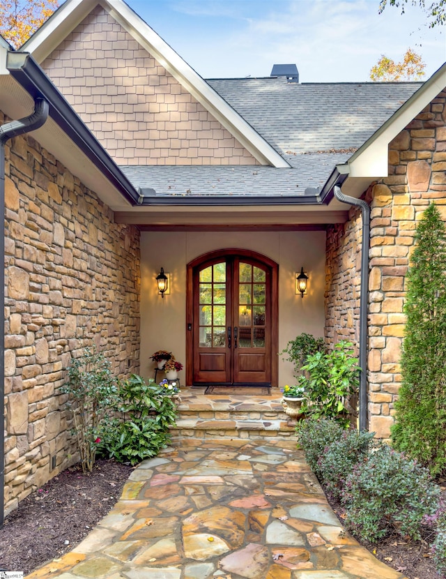 doorway to property featuring french doors