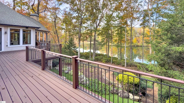 deck featuring a water view