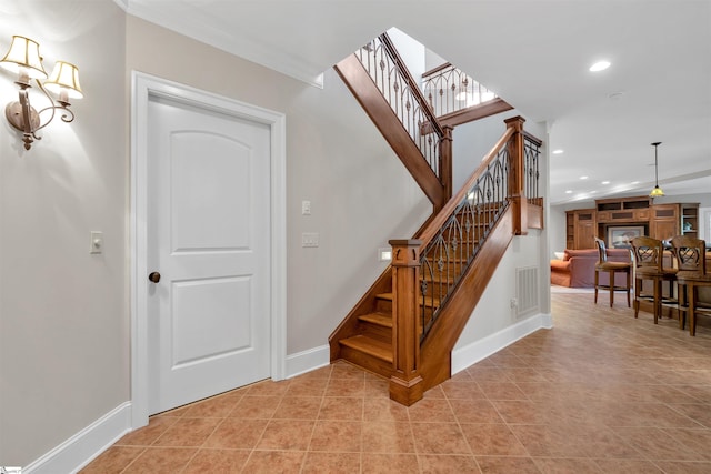 stairs with tile patterned flooring