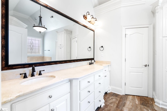 bathroom featuring vanity, lofted ceiling, and ornamental molding