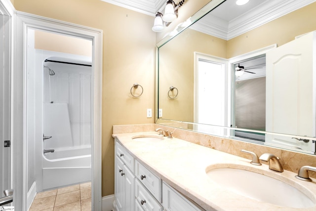 bathroom with ceiling fan, vanity, crown molding, washtub / shower combination, and tile patterned flooring