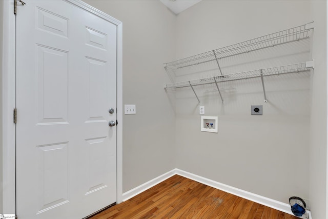 laundry room featuring hookup for an electric dryer, wood-type flooring, and hookup for a washing machine