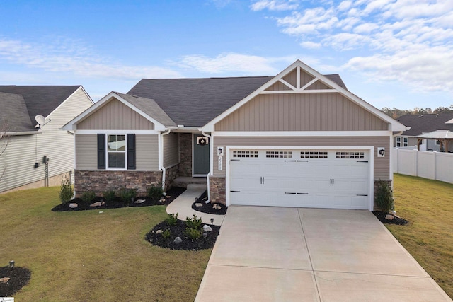 craftsman-style house with a front yard and a garage