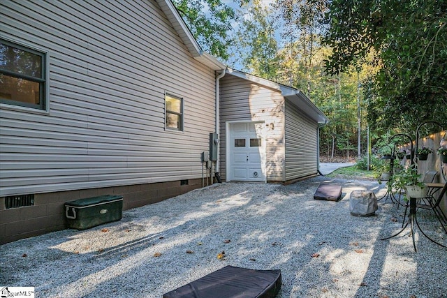 view of home's exterior with a patio