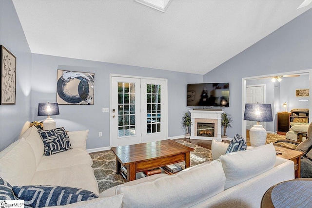 living room featuring vaulted ceiling