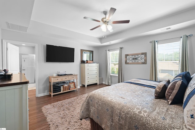 bedroom with dark wood-type flooring and ceiling fan