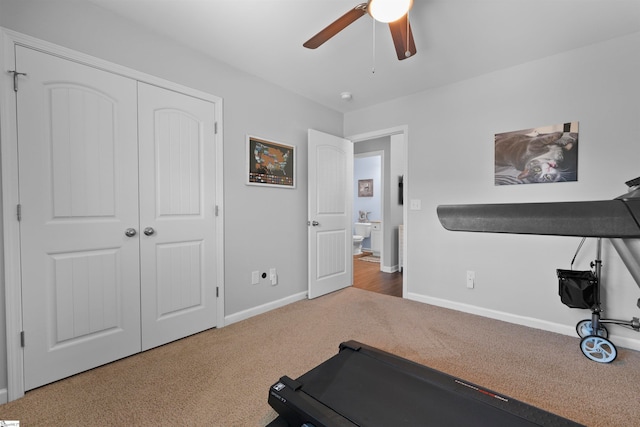 exercise room featuring carpet floors and ceiling fan