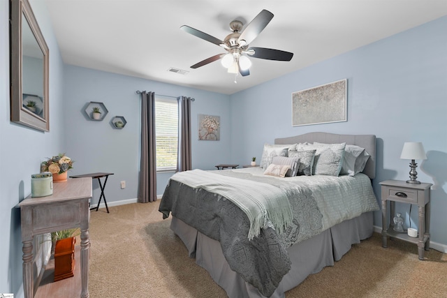 carpeted bedroom featuring ceiling fan