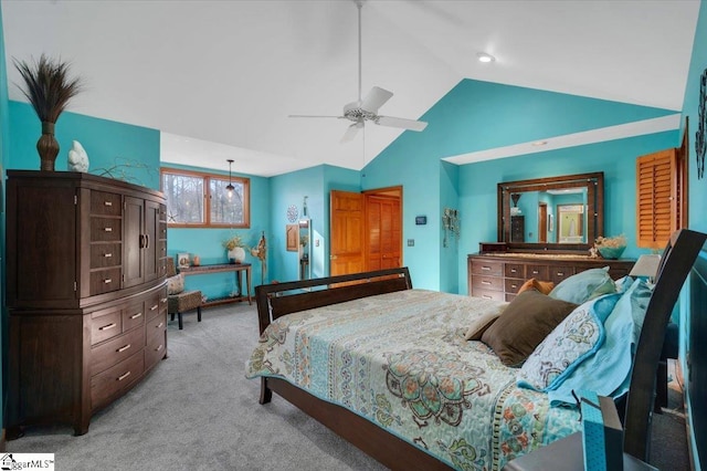 carpeted bedroom featuring high vaulted ceiling and ceiling fan