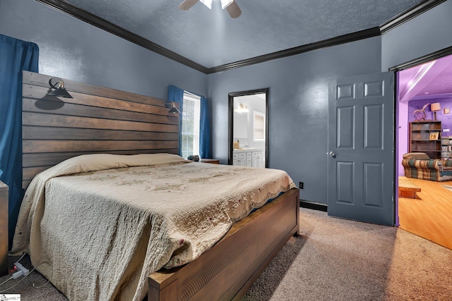 carpeted bedroom featuring ornamental molding, a textured ceiling, ceiling fan, and connected bathroom