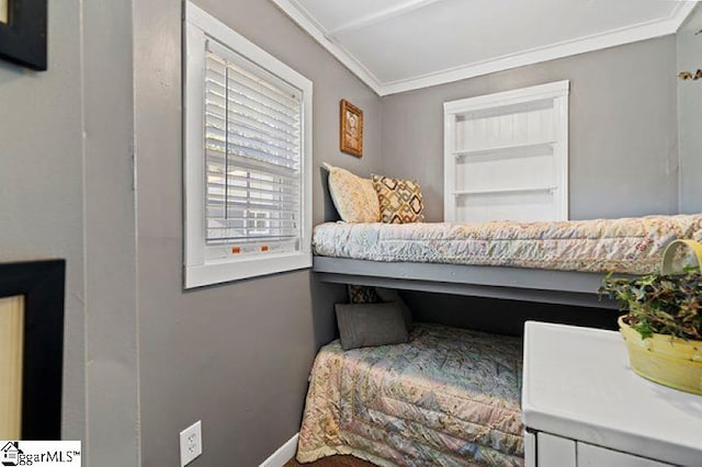 bedroom with crown molding