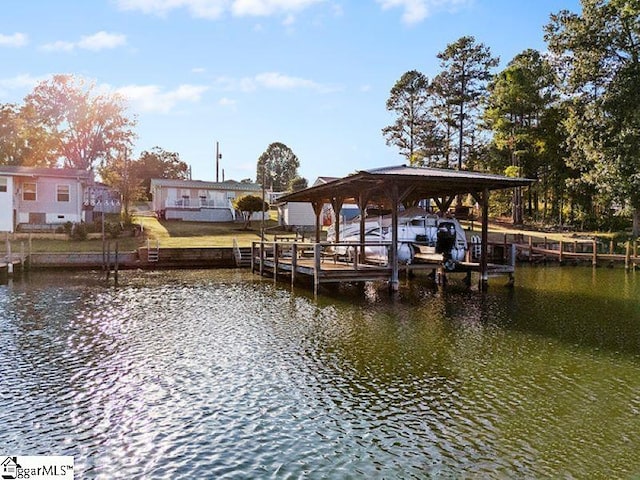 dock area with a water view