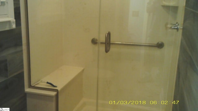 bathroom with walk in shower