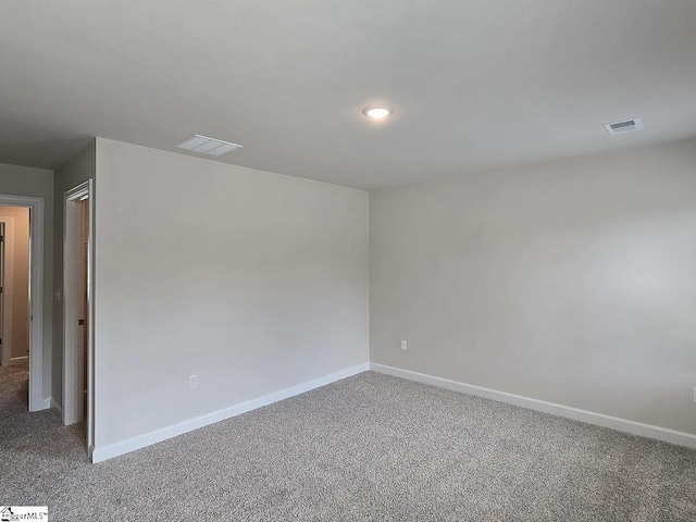 spare room with carpet floors