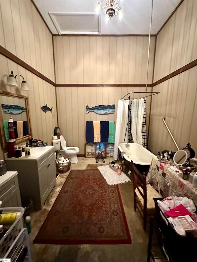 bathroom with a bathtub, wooden walls, and toilet