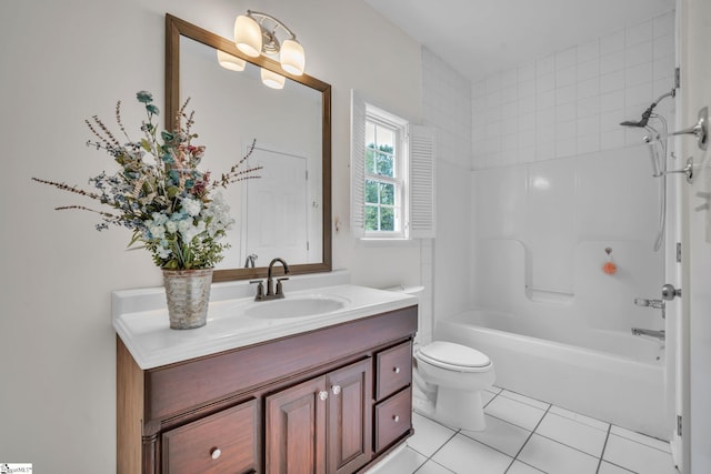 full bathroom with tile patterned flooring, vanity, toilet, and tiled shower / bath