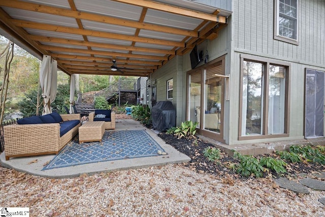 view of patio / terrace featuring a grill, ceiling fan, and an outdoor hangout area