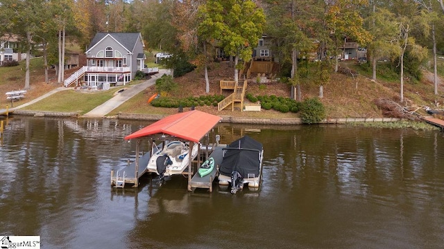 dock area with a water view