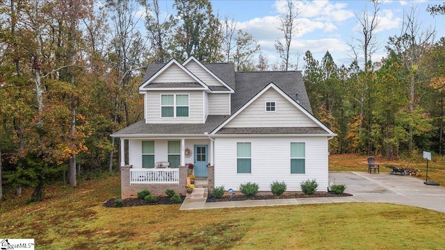 craftsman house featuring a front yard and covered porch