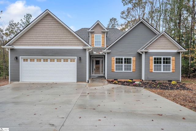 view of front of home with a garage