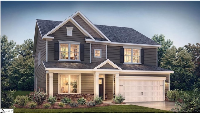 craftsman-style home featuring a garage and a front lawn