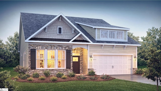 craftsman house with a garage and a front lawn