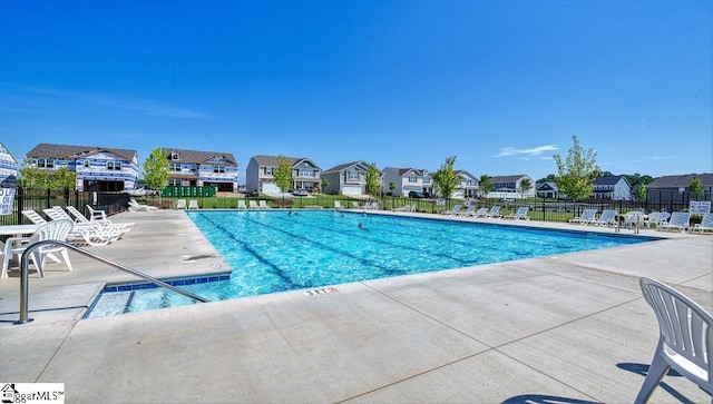 view of pool featuring a patio area