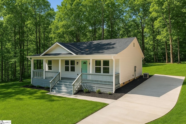 425 Tiger Ln, Westminster, SC 29693 - view of front of property featuring covered porch, a shingled roof, central AC, and a front yard