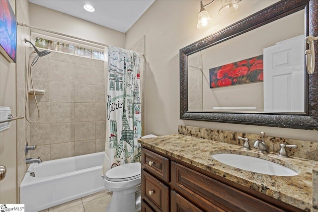 full bathroom featuring toilet, shower / bath combo, vanity, and tile patterned flooring