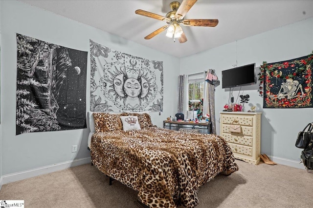 carpeted bedroom featuring ceiling fan