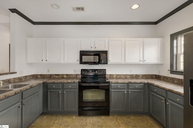 kitchen with white cabinetry, gray cabinetry, and black appliances