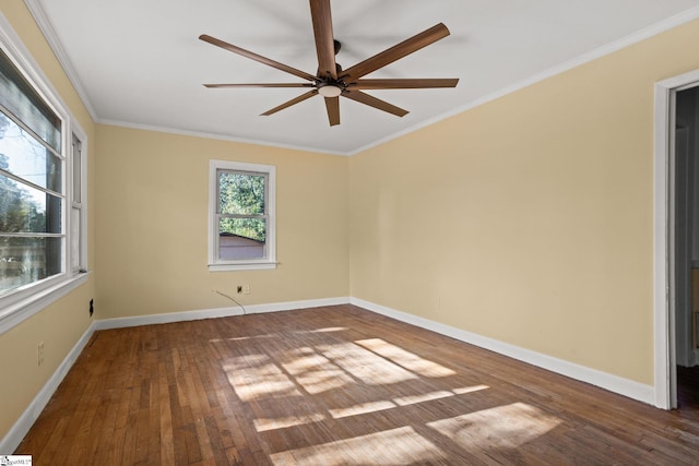 spare room with ornamental molding, hardwood / wood-style floors, and ceiling fan