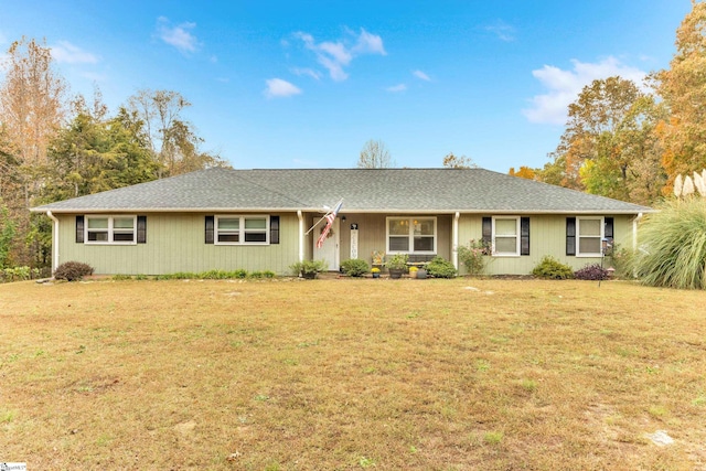 ranch-style house featuring a front yard