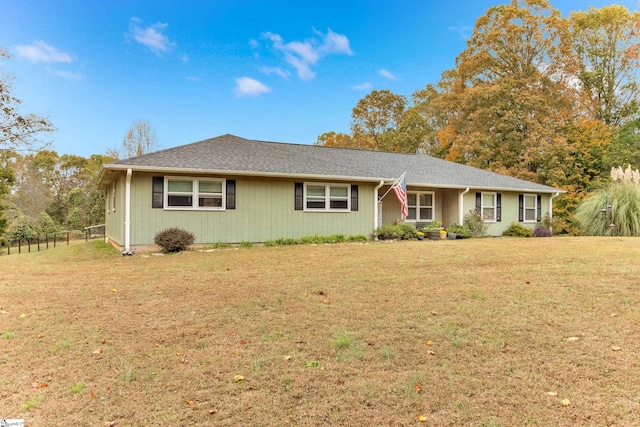 single story home with a front yard