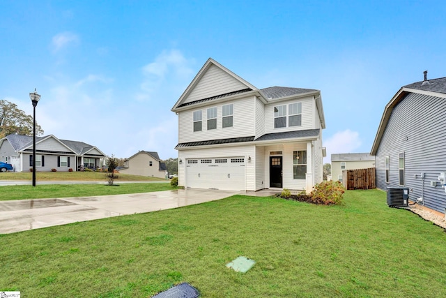 view of front facade with a front lawn and a garage