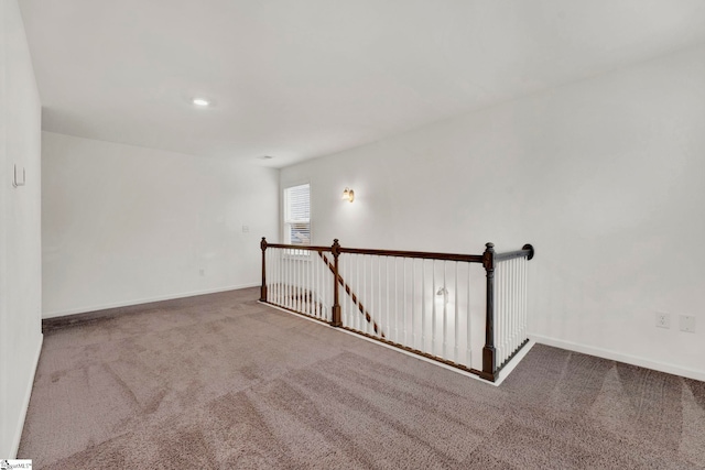 unfurnished room with carpet floors