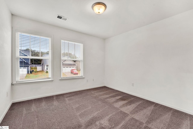 empty room with carpet floors