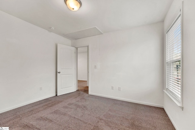 spare room with carpet flooring