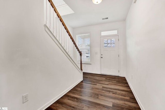 entryway featuring dark wood-type flooring