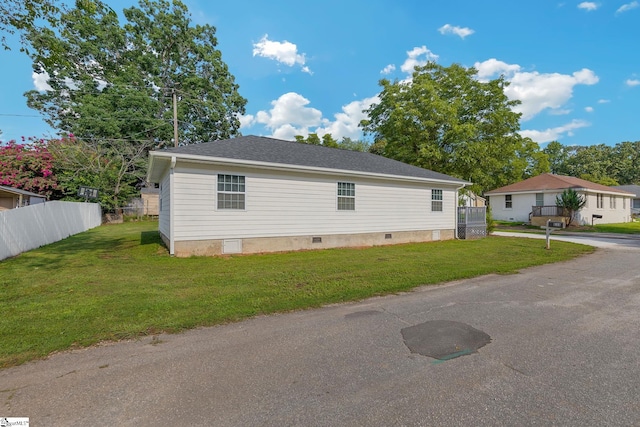 view of property exterior featuring a yard